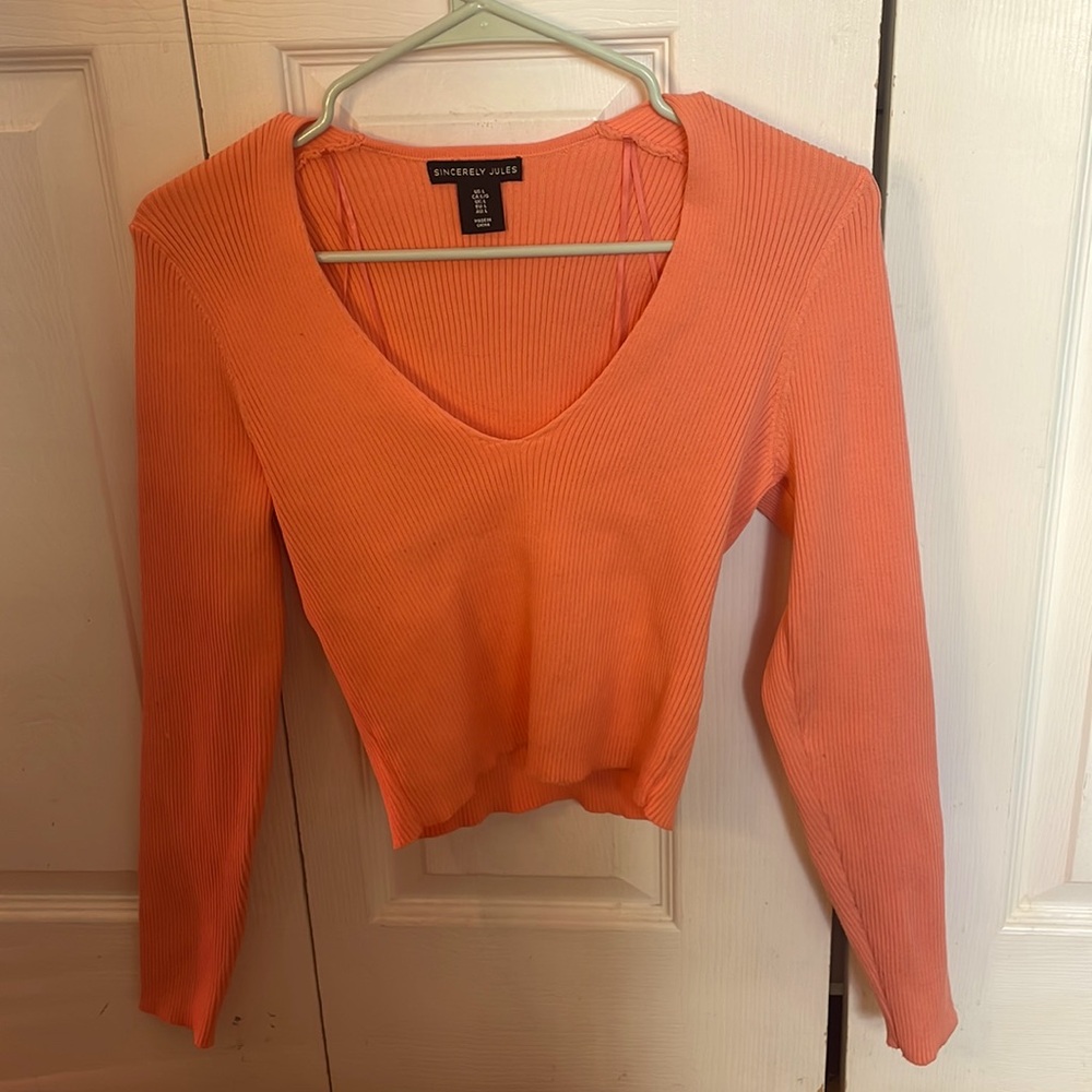 Coral, long sleeve, fits a medium, stretchy